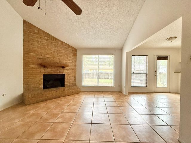 6 Maywind Court, The Woodlands, TX 77381