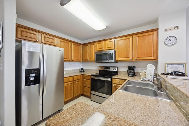 13415 BLUE HERON BEACH DRIVE 402, Orlando, FL 32821