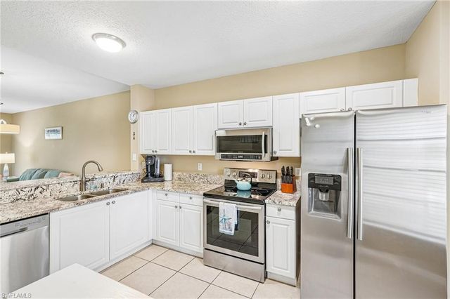 9185 Celeste DR 1-103, Naples, FL 34113