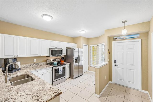 9185 Celeste DR 1-103, Naples, FL 34113