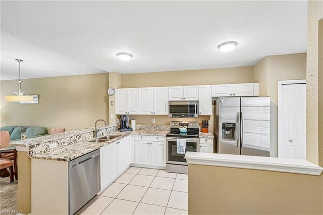9185 Celeste DR 1-103, Naples, FL 34113