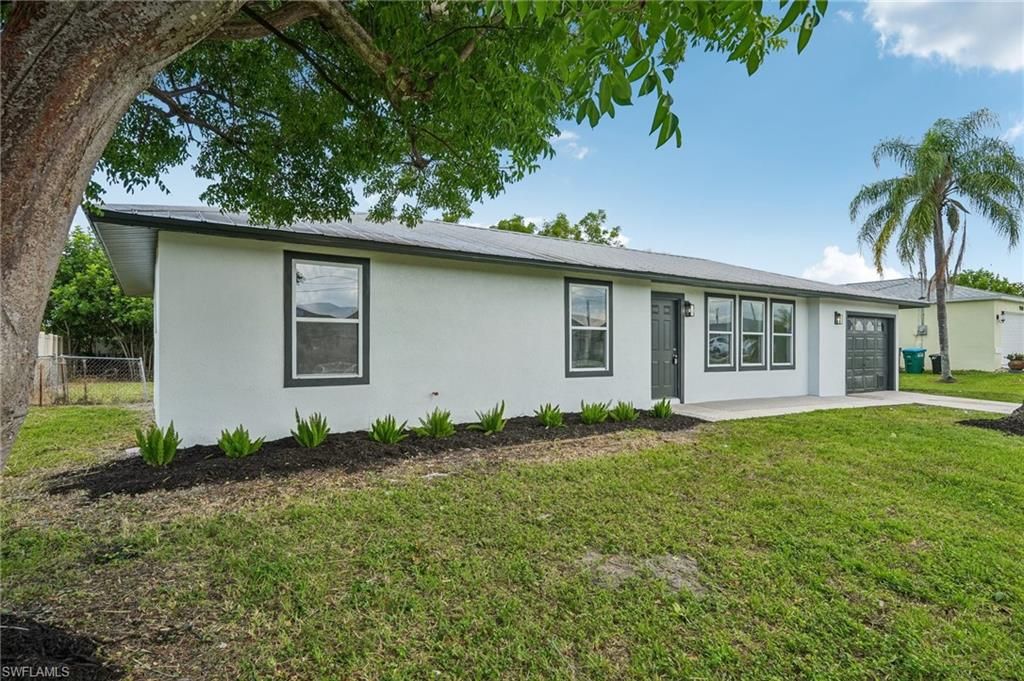 706 SW 31st ST, CAPE CORAL, FL 33914 — photo 2