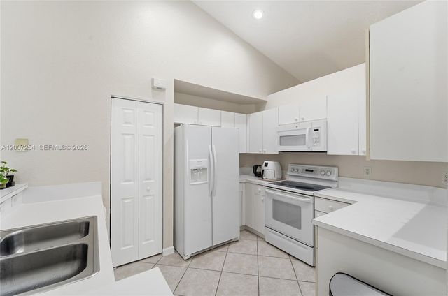 1004 Golden Cane Dr, Weston, FL 33327