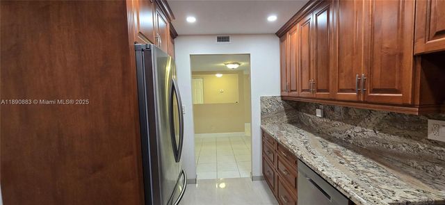 10777 W Sample Rd 402, Coral Springs, FL 33065