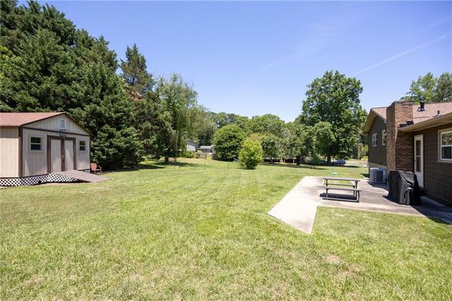 211 MAYFLOWER Drive, Woodstock, GA 30188