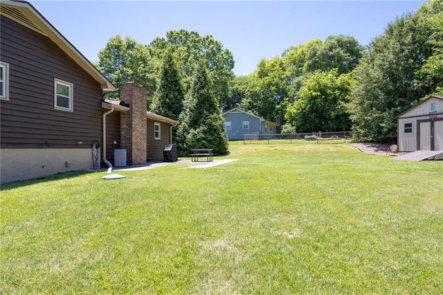 211 MAYFLOWER Drive, Woodstock, GA 30188