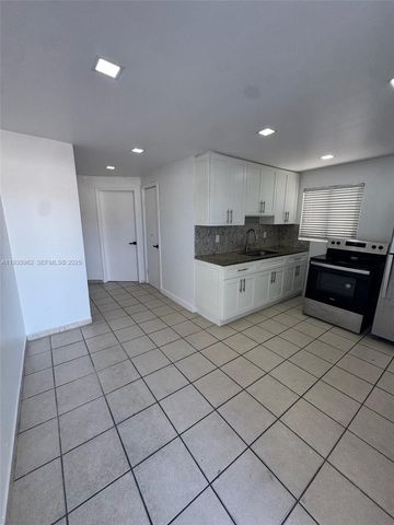 290 NW 45th Ave ., Miami, FL 33126