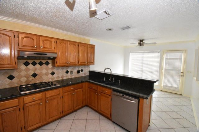 9007 Woodleigh, Houston, TX 77083