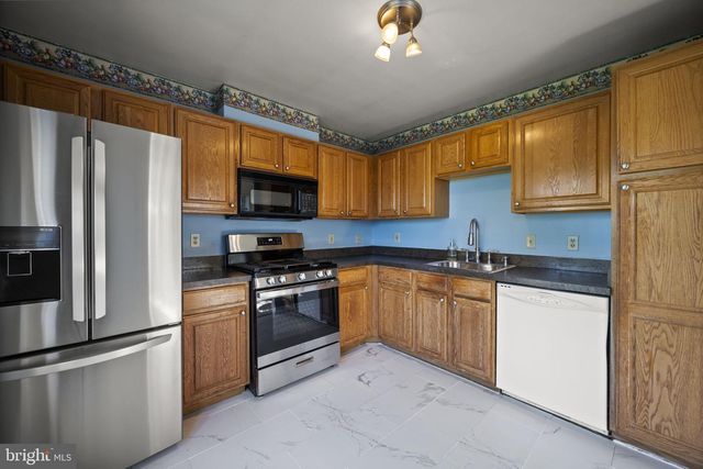 5901 MILLRACE CT NW #H302, Columbia, MD 21045