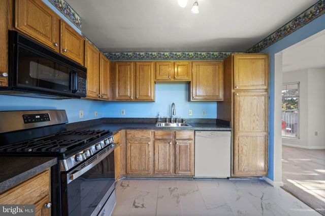 5901 MILLRACE CT NW #H302, Columbia, MD 21045