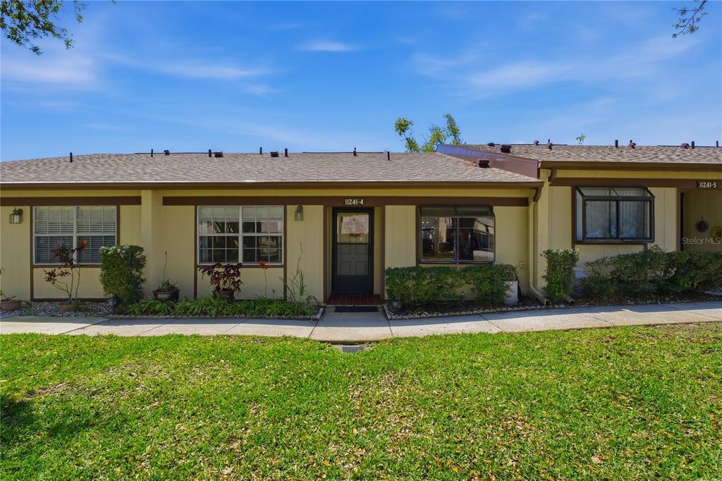 Image 1 of property listing at 11241 DOLLAR LAKE DRIVE 4, Port Richey, FL 34668