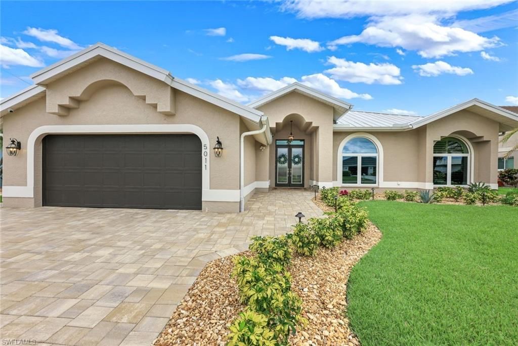 Image 2 of property listing at 5011 SW 5th PL, Cape Coral, FL 33914