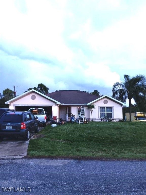 2402 E 11th ST, Lehigh Acres, FL 33936