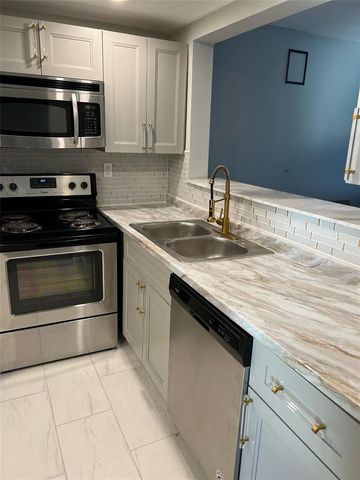9070 Lime Bay Boulevard 209, Tamarac, FL 33321
