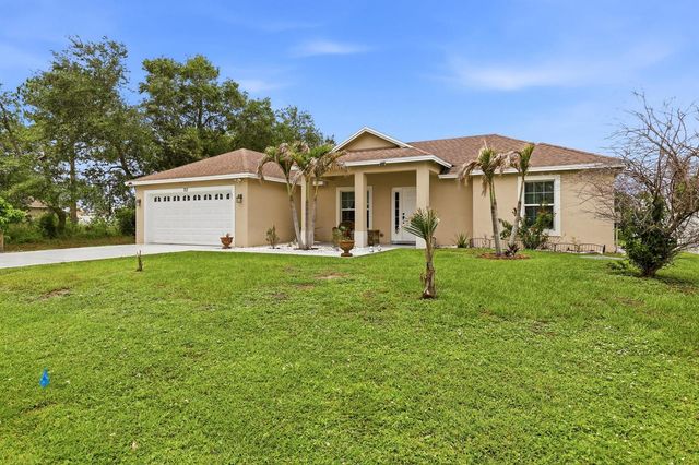 713 NW Biscayne Drive, Port St. Lucie, FL 34983