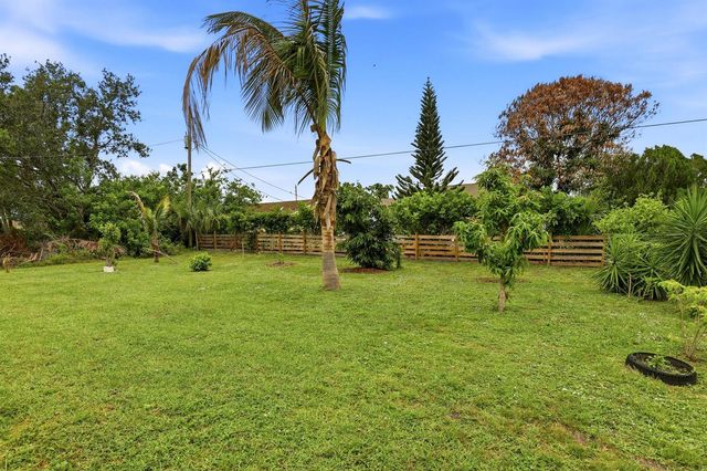713 NW Biscayne Drive, Port St. Lucie, FL 34983