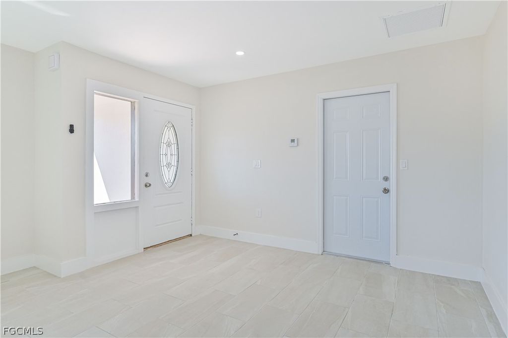 Image 25 of property listing at 115 SE 24th AVE A-B, Cape Coral, FL 33990