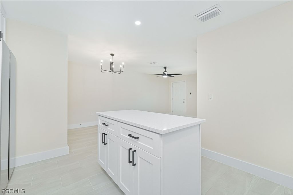 Image 9 of property listing at 115 SE 24th AVE A-B, Cape Coral, FL 33990