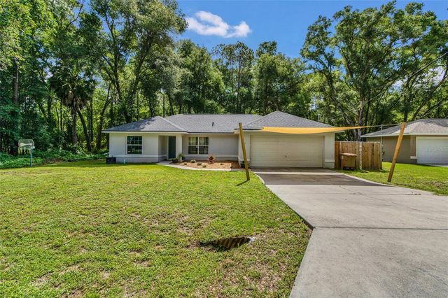 9 SEQUOIA LOOP LANE, Ocklawaha, FL 32179