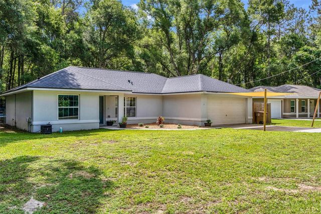 9 SEQUOIA LOOP LANE, Ocklawaha, FL 32179