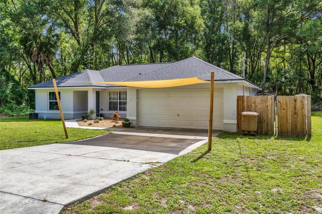 9 SEQUOIA LOOP LANE, Ocklawaha, FL 32179