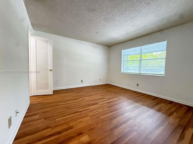 8982 W Sample Rd 204, Coral Springs, FL 33065
