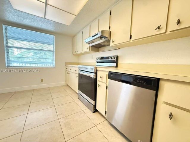 8982 W Sample Rd 204, Coral Springs, FL 33065