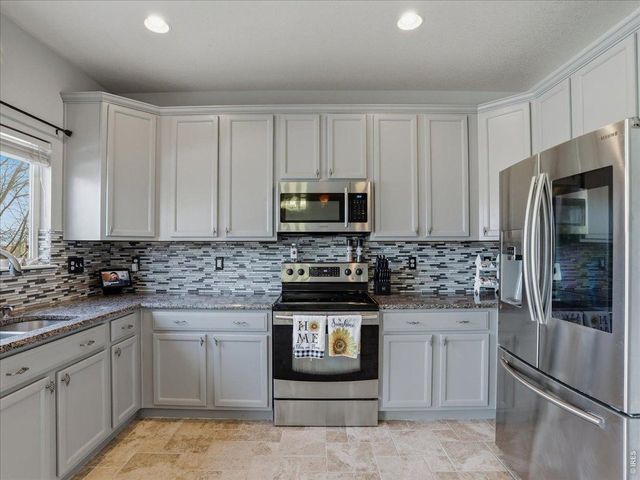 24703 E Kansas Cir, Aurora, CO 80018