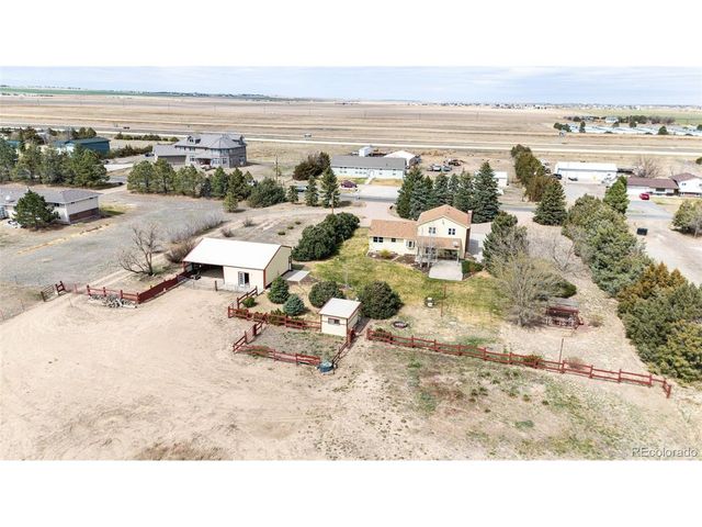 55004 E Bison Dr, Strasburg, CO 80136