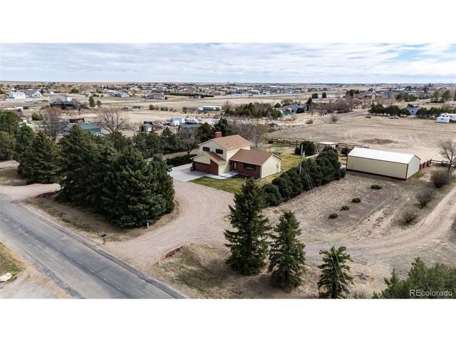 55004 E Bison Dr, Strasburg, CO 80136