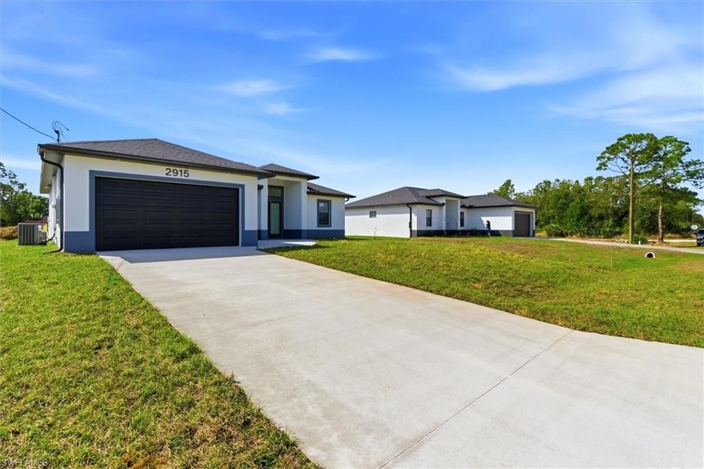 2913 24th ST W, LEHIGH ACRES, FL 33976 — photo 2