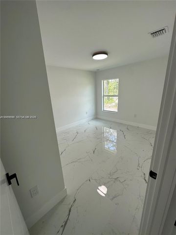 1125 Milwaukee Blvd, Lehigh Acres, FL 33974
