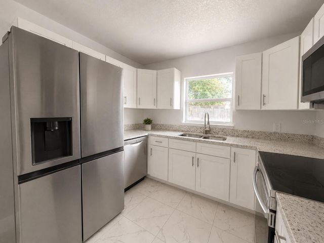 4615 AEGEAN AVENUE, Holiday, FL 34690