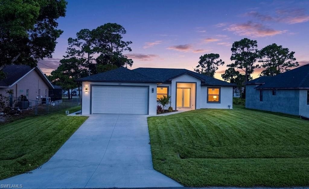 4715 7th ST W, LEHIGH ACRES, FL 33971 — photo 2