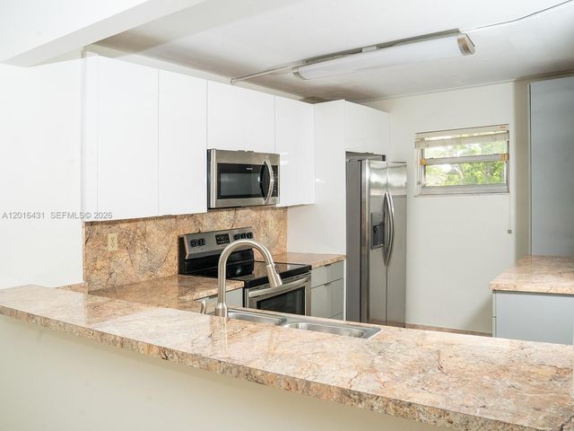 1100 NW 87th Ave 308, Coral Springs, FL 33071