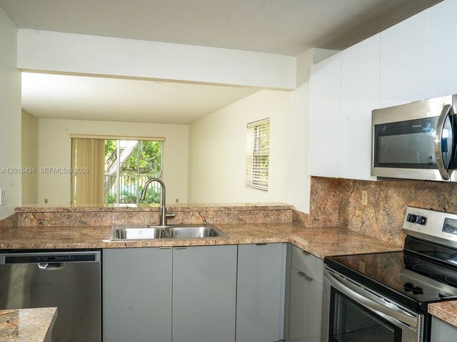 1100 NW 87th Ave 308, Coral Springs, FL 33071