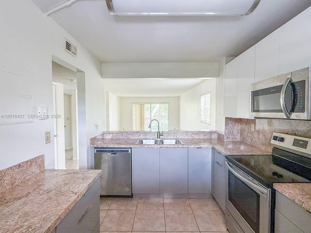 1100 NW 87th Ave 308, Coral Springs, FL 33071