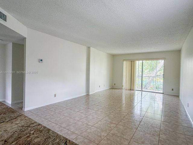 1100 NW 87th Ave 308, Coral Springs, FL 33071