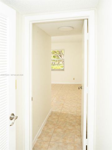 1100 NW 87th Ave 308, Coral Springs, FL 33071