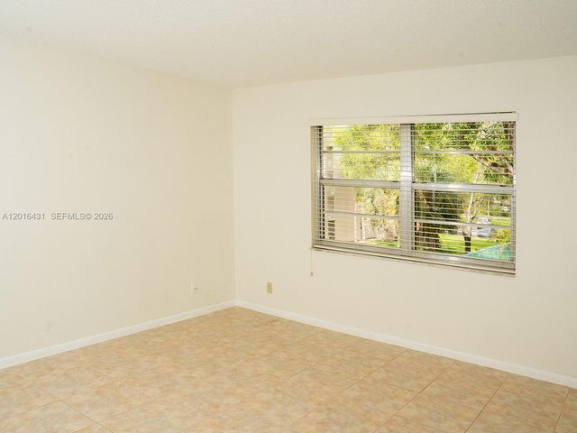 1100 NW 87th Ave 308, Coral Springs, FL 33071