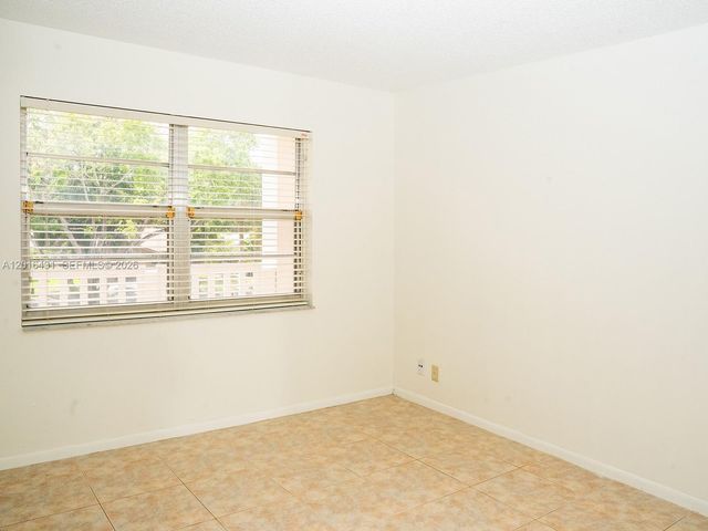 1100 NW 87th Ave 308, Coral Springs, FL 33071