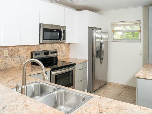 1100 NW 87th Ave 308, Coral Springs, FL 33071