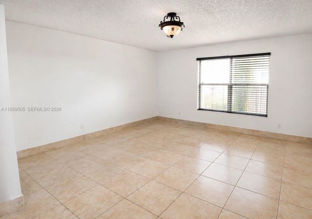 7501 Kimberly Boulevard 104, North Lauderdale, FL 33068