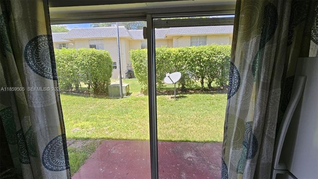 7501 Kimberly Boulevard 104, North Lauderdale, FL 33068