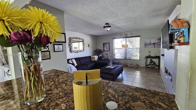 7501 Kimberly Boulevard 104, North Lauderdale, FL 33068