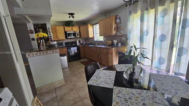 7501 Kimberly Boulevard 104, North Lauderdale, FL 33068