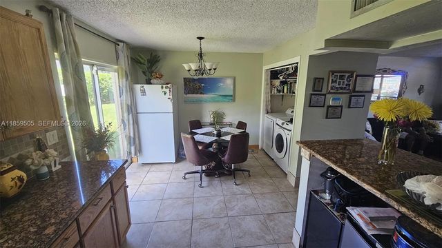 7501 Kimberly Boulevard 104, North Lauderdale, FL 33068
