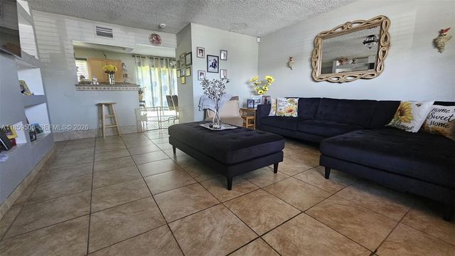 7501 Kimberly Boulevard 104, North Lauderdale, FL 33068