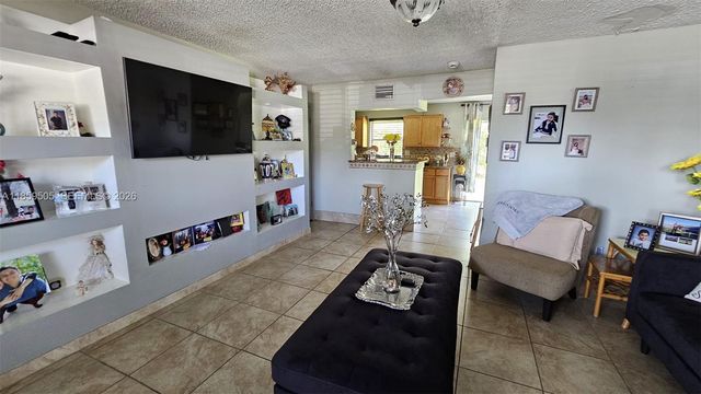 7501 Kimberly Boulevard 104, North Lauderdale, FL 33068