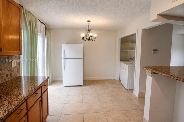 7501 Kimberly Boulevard 104, North Lauderdale, FL 33068